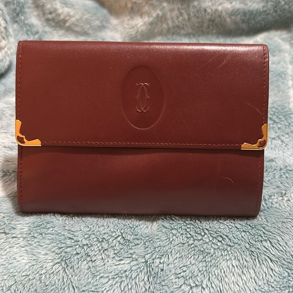 Cartier Handbags - Cartier Burgundy Tri Fold Wallet With Kiss Lock 💋